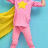 Vulnerable at work - kid dressed up in a pink and yellow superhero costume